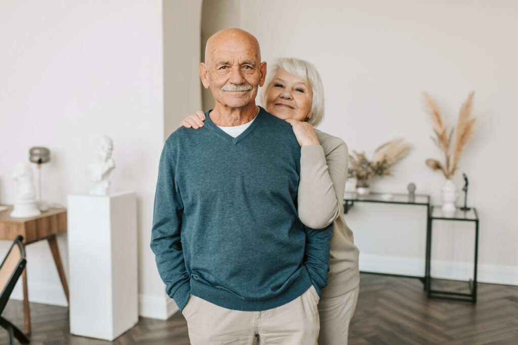 Older couple smiling; senior living communities